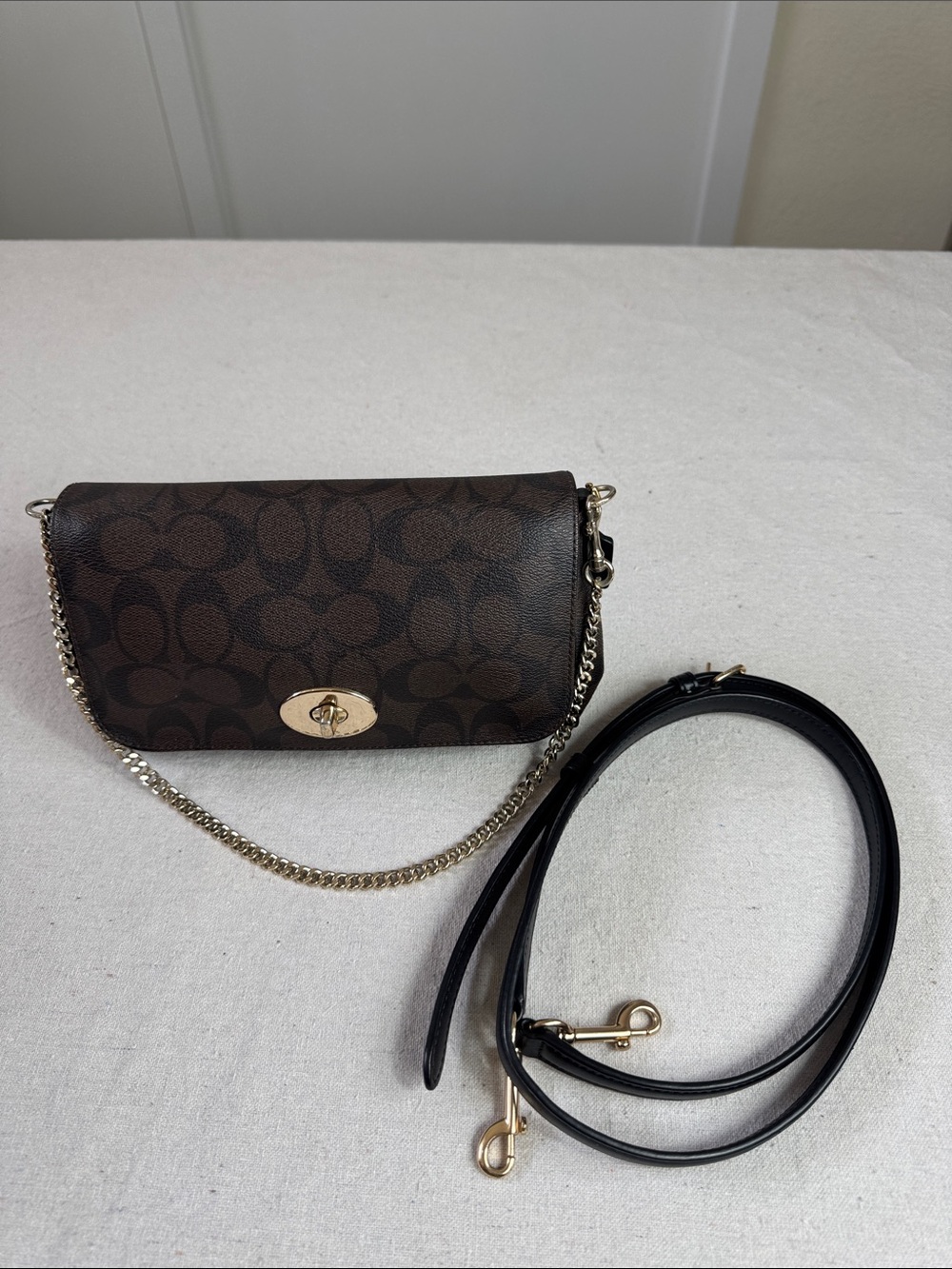 Coach Brown Signature Ruby Mini Crossbody with Gold Hardware bag.